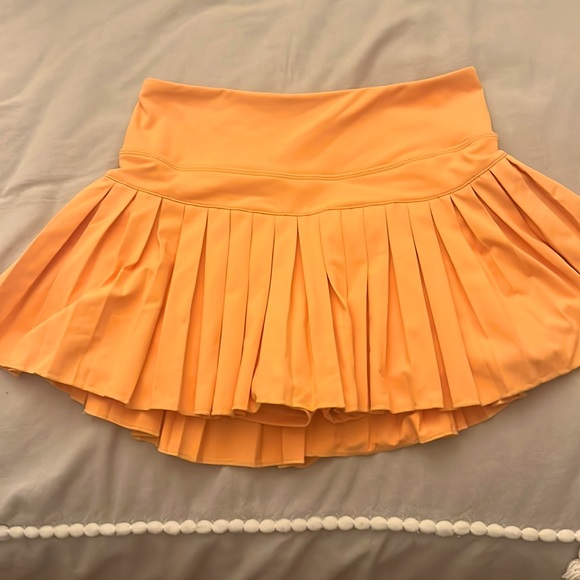 gold hinge Skirts Gold Hinge Sunrise Orange Pleated Tennis Skirt